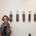 <p><span style="font-size: 80%;">Artist, Monica Kane, with her sculpture piece.</span></p><br/><p><span style="font-size: 80%;">Joe Mooney<br />"Facets"<br />Seraphin Gallery, Philadelphia, PA </span></p>